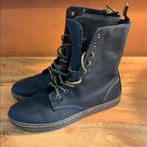 Woman’s black Dr Martin boots
